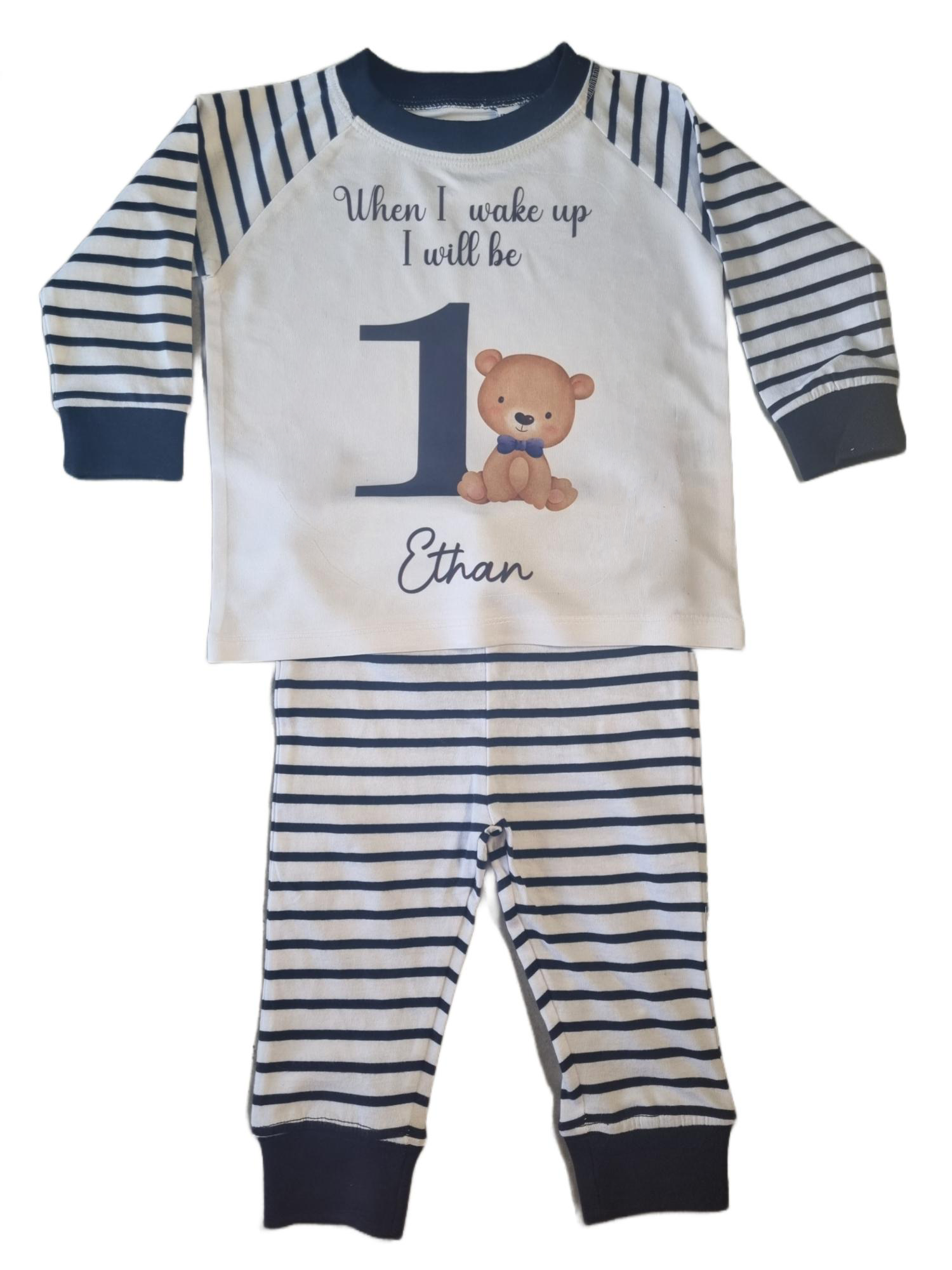 'When I wake up I will be' 1 navy and white stripe pyjamas with bear and blue bow tie, includes child's name, flat top and flat bottoms