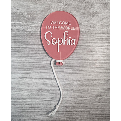 Red/Pink painted balloon acrylic with Welcome To The World Sophia example